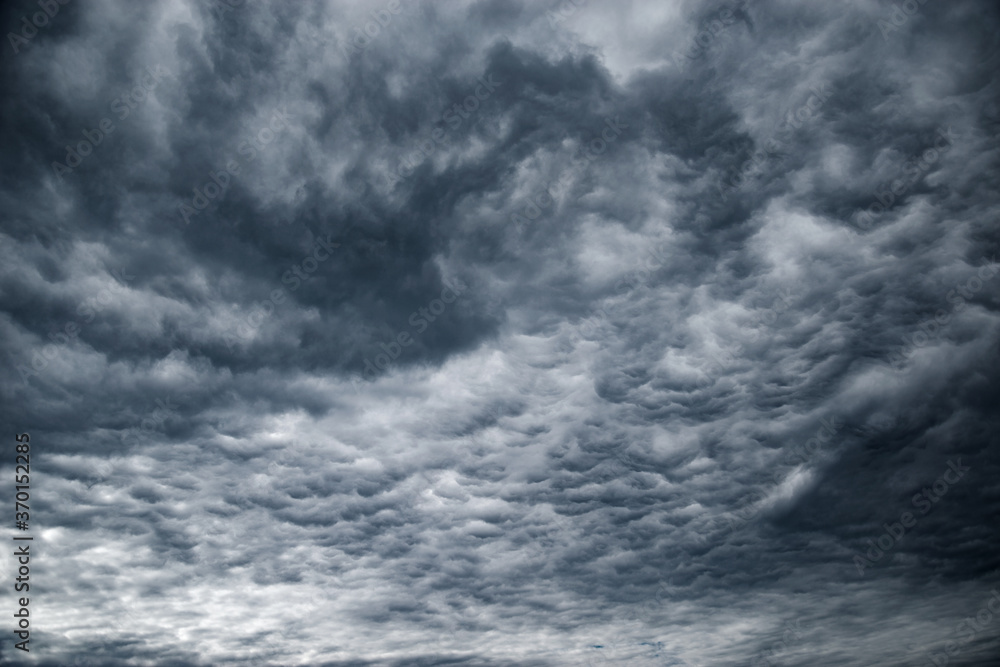 Dark storm clouds before the rain at day time. Dark storm clouds before the rain at day time.