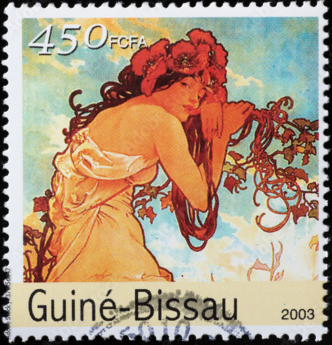 Illustration by Mucha on postage stamp of Guinea Bissau