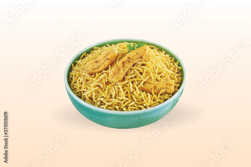 Indian Mathari made with fine wheat flour and namkeen Bikaneri Bhujiya made with chickpea flour (Besan), popular Indian snacks, Tasty namkeen Bikaneri Bhujiya made with chickpea flour, Bhujia sev photo