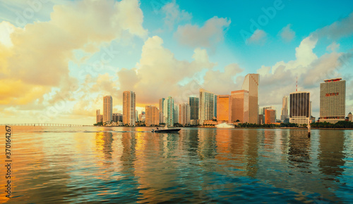 miami skyline at sunset sunrise reflection buildings downtown city sky beautiful boat sea morning 