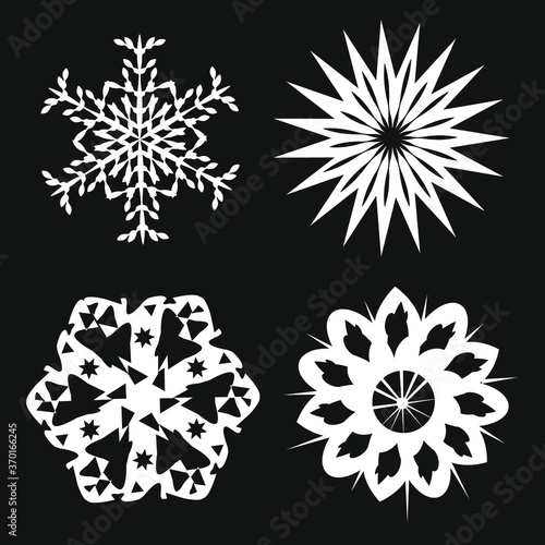 four paper snowflakes