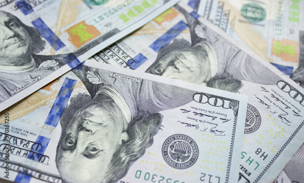 Front Facing Hundred Dollar Bills In Macro. Background of money. Front Facing Hundred Dollar Bills In Macro. Background of money.