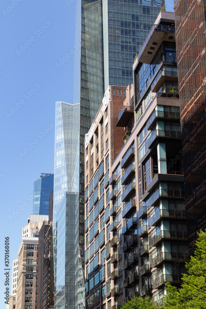 Fototapeta premium Beautiful Modern and Old Buildings and Skyscrapers on a Street in Manhattan of New York City