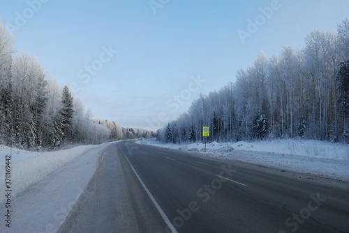 Khanty-Mansiysk. Western Siberia. Russia. January 20. 2011. Khanty - Mansiysk-Tyumen highway on a Sunny winter day.