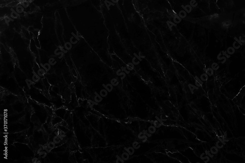 Natural black marble surface, beautiful patterned and scratched with high resolution, used for design work. And interior decoration
