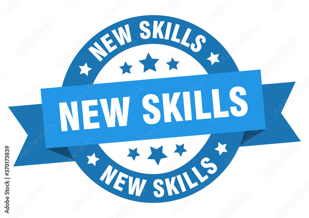 Fototapeta premium new skills round ribbon isolated label. new skills sign