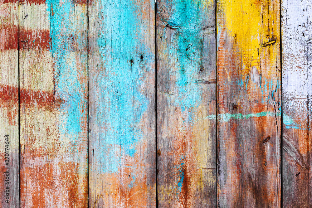 Background gloomy charred wooden fence in dark colors Background gloomy charred wooden fence in dark colors
