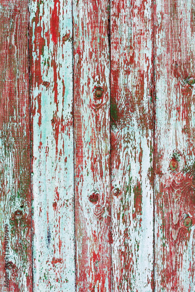 Background gloomy charred wooden fence in dark colors