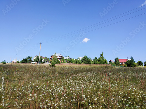 Year landscape in rural terrain with type on village