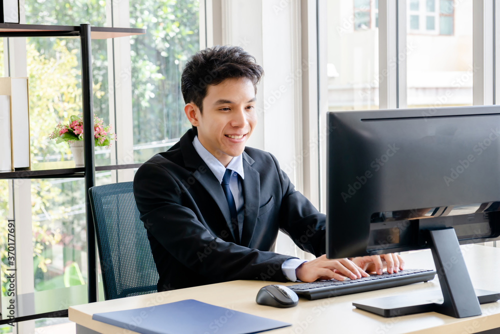 young man work with computer