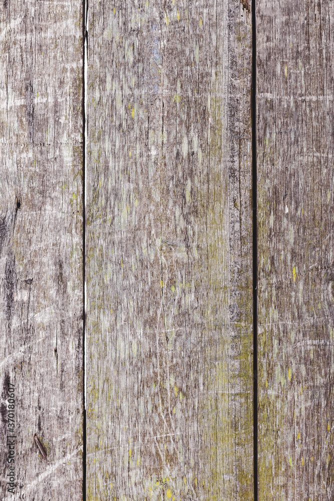 Background gloomy charred wooden fence in dark colors Background gloomy charred wooden fence in dark colors
