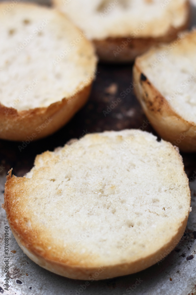Toasted halves of bread rolls