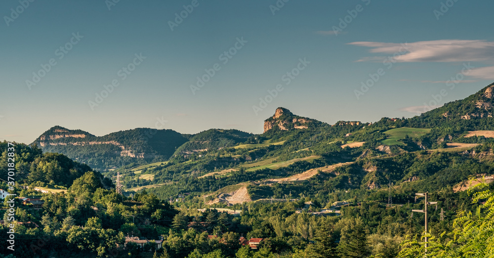 Fototapeta premium The Badolo cliff (Rocca di Badolo) and Mount Mario viewed from Vado on the Setta River Valley, Bologna hillside, Emilia Romagna, Italy.