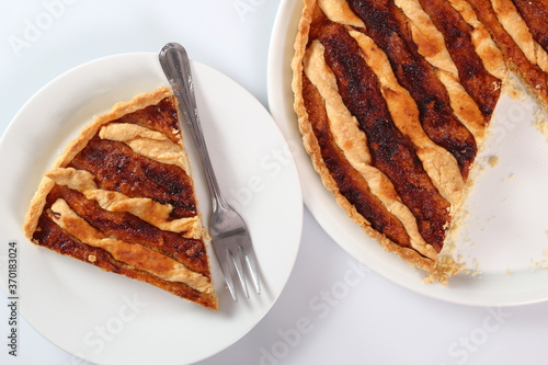 Shoofly Tart with Golden Syrup Filling. Isolated on white background. photo