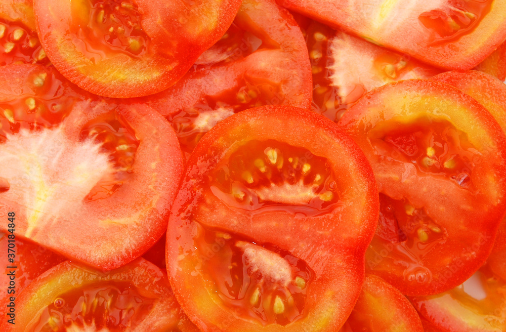 Healthy natural food, background. Tomatoes slices. More background of fruits and vegetables in my portfolio. Healthy natural food, background. Tomatoes slices. More background of fruits and vegetables in my portfolio.