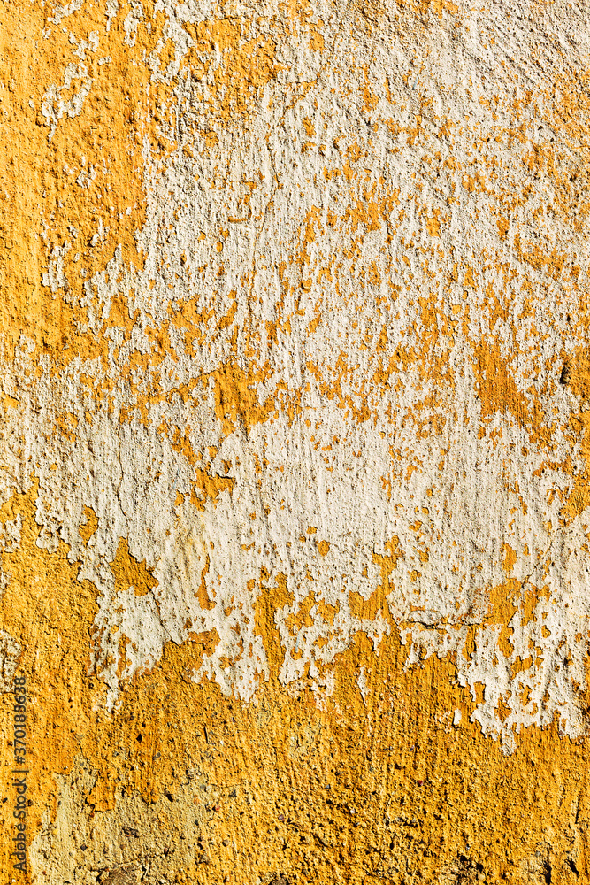 Abstract creative background of chaotic strokes of old cracked paint on concrete wall. Old surface with traces of paint, weathered, scratches and cracks for design Abstract creative background of chaotic strokes of old cracked paint on concrete wall. Old surface with traces of paint, weathered, scratches and cracks for design