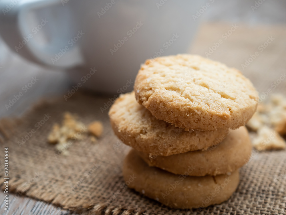 Stacked biscuit sweet cookie on rustic wooden table Stacked biscuit sweet cookie on rustic wooden table