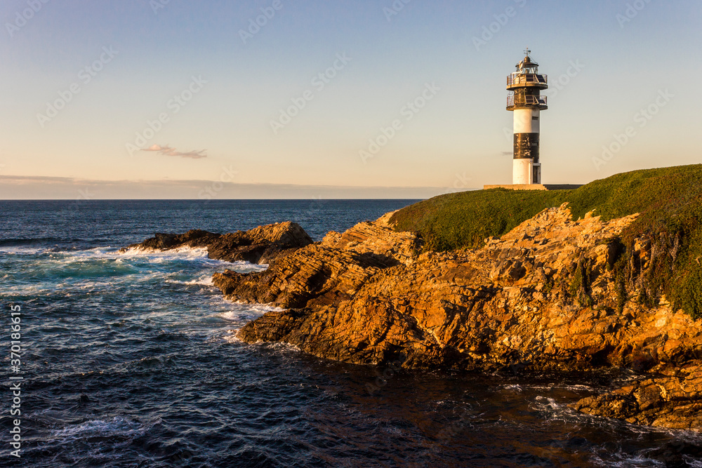 Ribadeo, Spain. The lighthouse at Illa Pancha, an island in the coast of Galicia