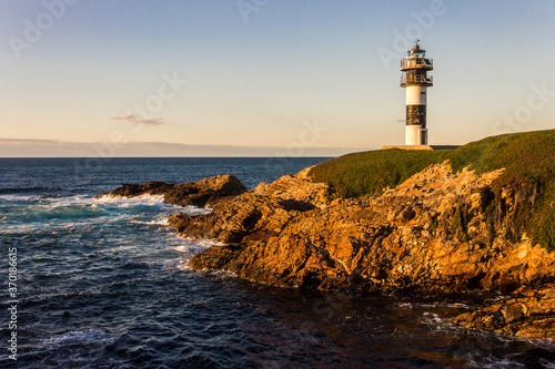 Ribadeo, Spain. The lighthouse at Illa Pancha, an island in the coast of Galicia