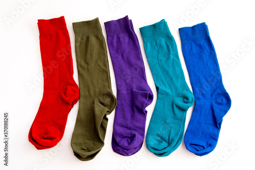 Top view of new colorful socks isolate on white background.
