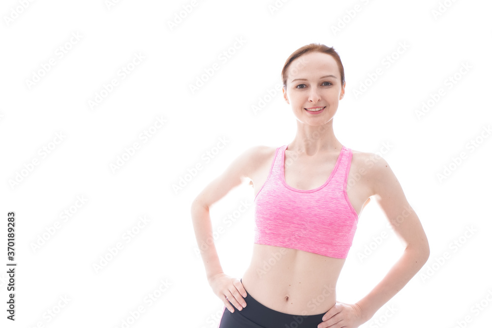 ストレッチをする笑顔の若い女性 ストレッチをする笑顔の若い女性