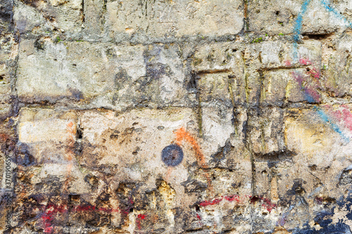 Abstract background old white brick wall with cracks and scratches. Landscape style. Great background or texture.