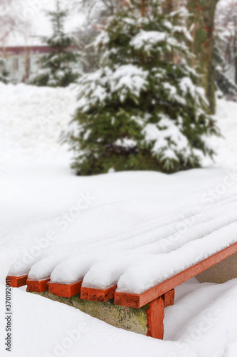 Wallpaper Mural Bench in a park covered completely by snow after heavy snowfall Torontodigital.ca