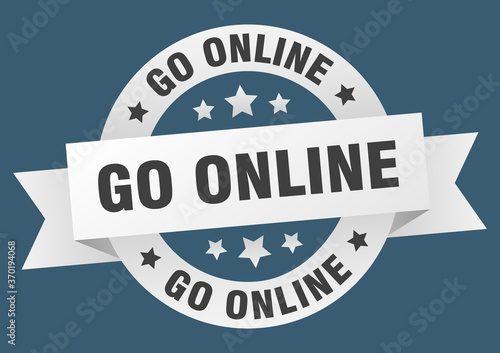go online round ribbon isolated label. go online sign