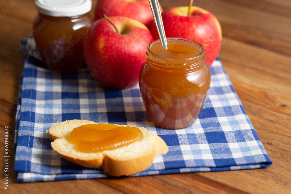 Homemade apple jam. Slice of bread with jam on top. Homemade apple jam. Slice of bread with jam on top.