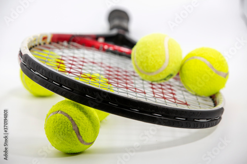 Sport. Tennis racket and ball. Isolated on the white background © Seluk