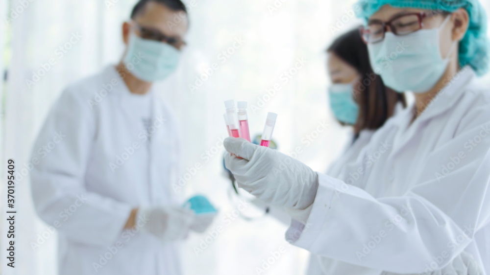 scientists working in laboratory scientists working in laboratory
