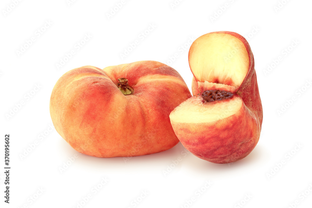 Whole and cut flat peaches isolated on white Whole and cut flat peaches isolated on white