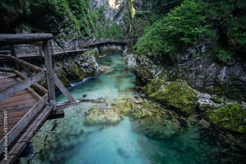 Vintgar Gorge in Slovenia, view of the river and waterfall in the green. 
