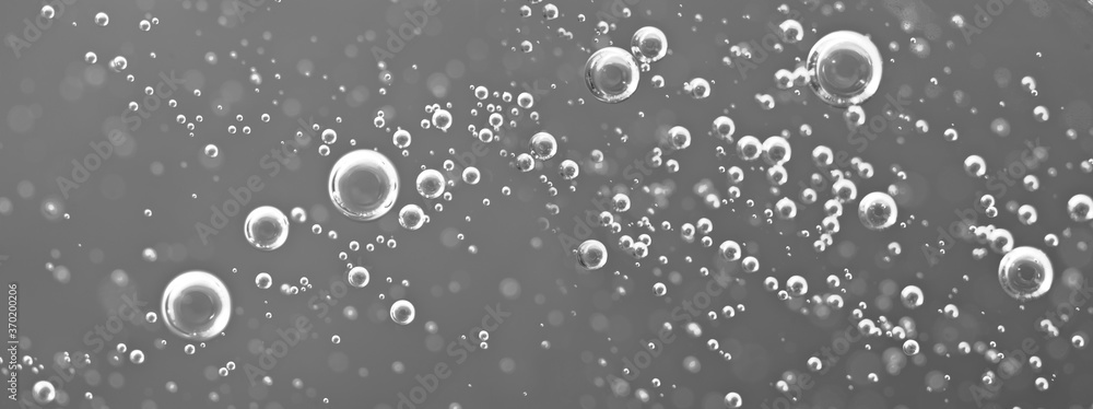 Macro Oxygen bubbles in water, concept such as ecology and other projects.  Copy Space. Banner format.