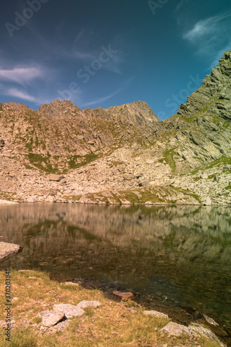 Mountain lake in the summer time hiking 
