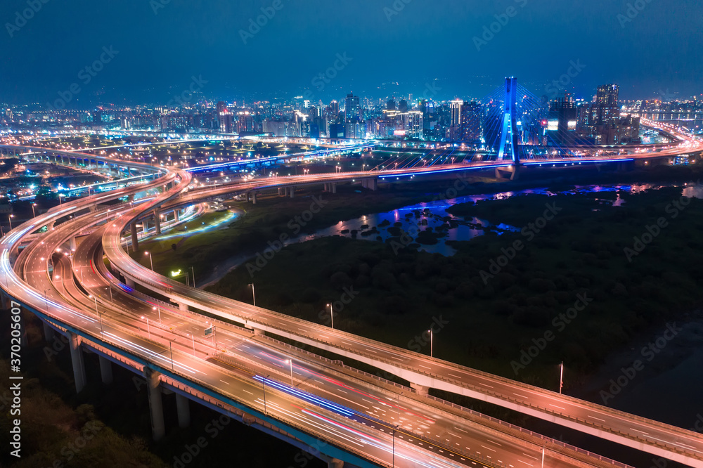 Taiwan, New Taipei City, the beautiful twists and turns of the river, reflecting the sky, bridges, city beautiful scenery. Taiwan, New Taipei City, the beautiful twists and turns of the river, reflecting the sky, bridges, city beautiful scenery.