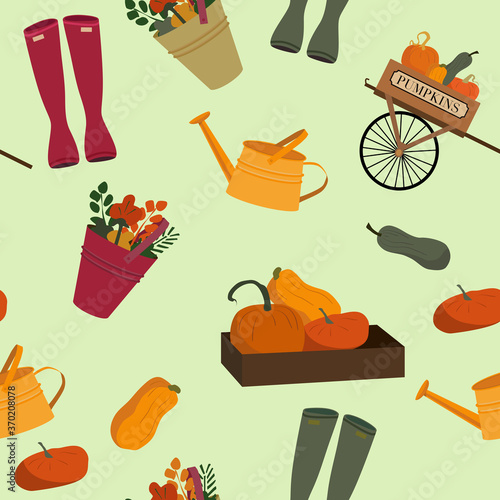 Autumn harvest seamless pattern with wooden cart full of pumpkins,a box of squashes and bucket of flowers.Rubber boots and watering can in rustic style.Flat vector illustration for fabric,note cover