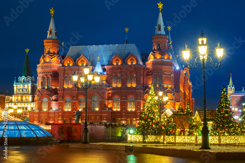 Russia. New Year's Moscow. Christmas decorations on the background of the Historical Museum. Manege square is decorated for Christmas.The city is waiting for the holiday. Festive evening in the Russia