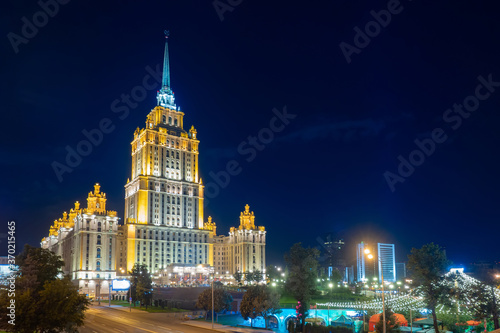 Evening Moscow. Russia. Stalin's skyscrapers in the Russian capital. The building of hotel Ukraine in Moscow. Beautiful high-rise building near the Moscow river. Evening in the Russian capital.