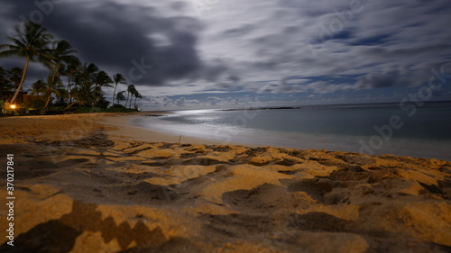 Sandy beach in Kauai under the moonlight
