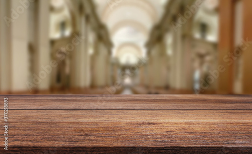 Wooden beautiful table on blurred bokeh background