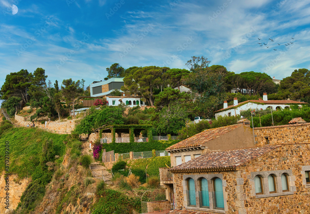 Houses built in the middle of nature in the seaside town Tossa de Mar. Costa brava. (Catalonia).