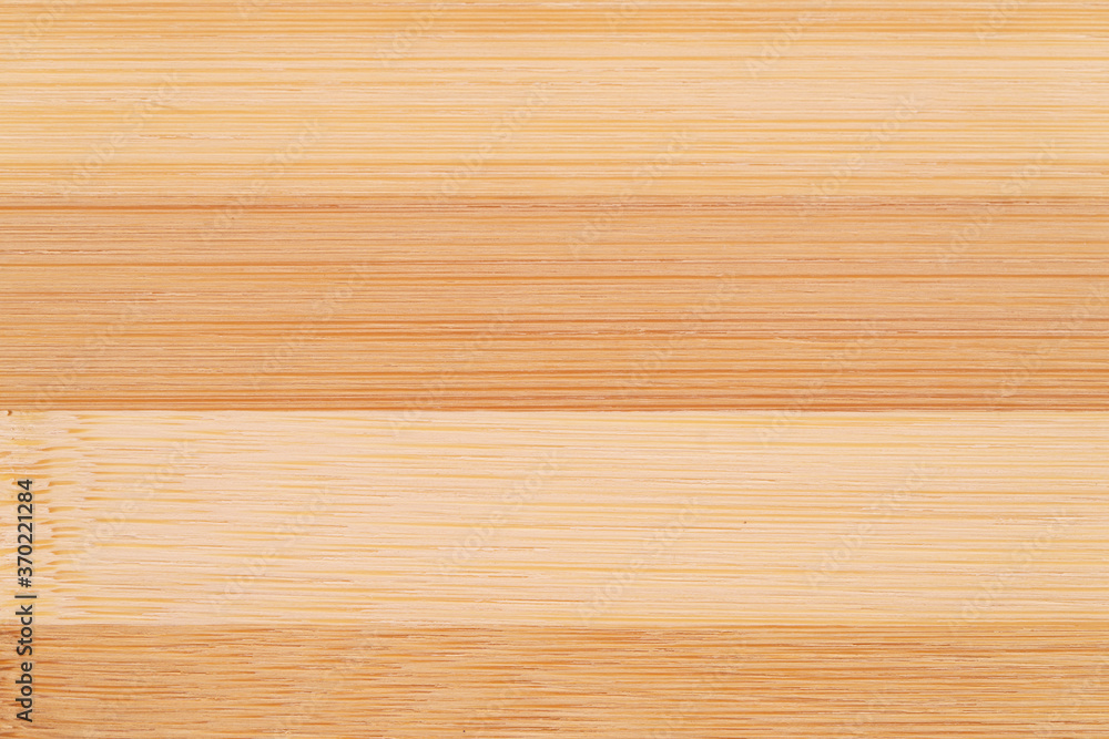 Fototapeta premium Abstract bamboo wooden texture background. Close up of cutting board
