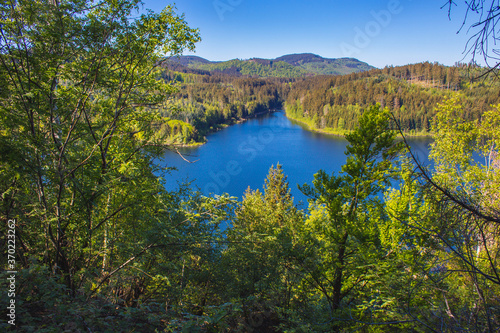 view of Granestausee reservoir and forest at Harz Mountains National Park, Germany
