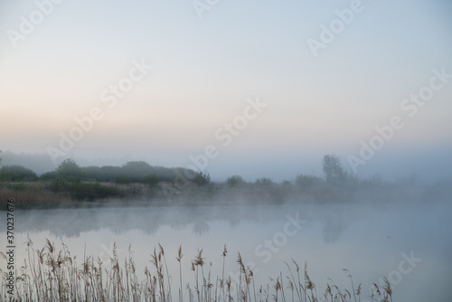 Morning's fog over the lake