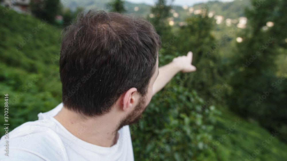 White skin man talking video on phone in nature White skin man talking video on phone in nature