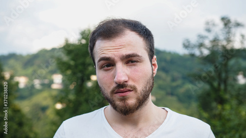Handsome man with unstable problems in nature