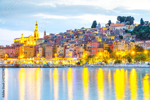 Menton mediaeval town on the French Riviera in the Mediterranean during sunset, France.