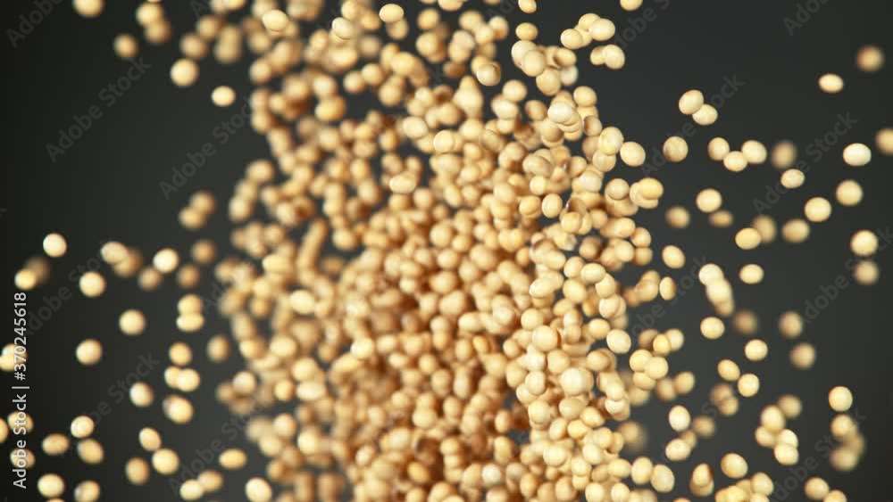 Super Slow Motion Shot of Soybeans Side Colision on Grey Background at 1000fps.