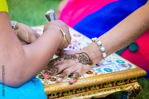 Indian Hindu bride's wedding henna mehendi menhdi hands close up photo